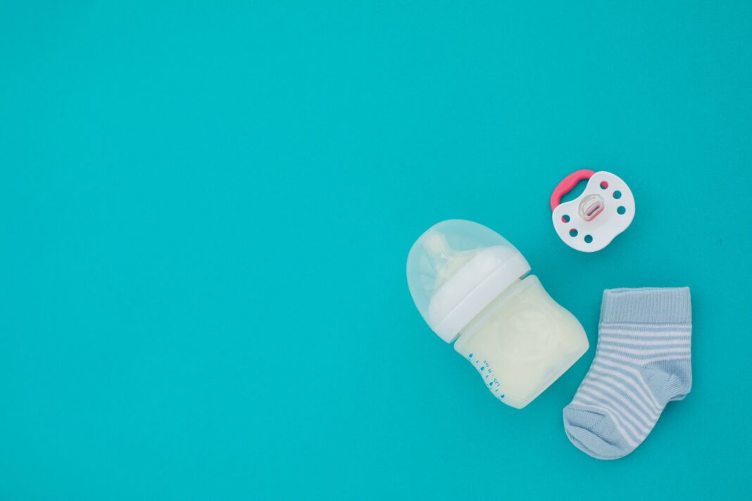 Top view of unisex newborn baby necessities
