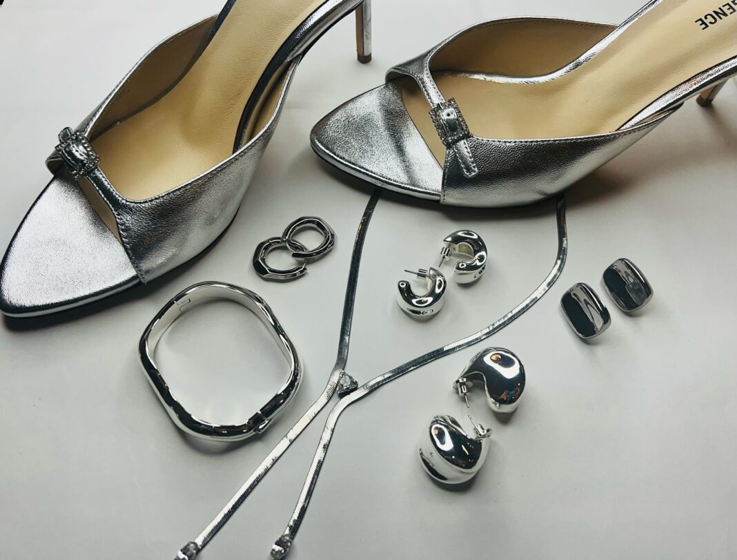 image0 Silver is a sprint style staple this year seen in these silver slingback high heel shoes silver pendant earrings and long chain silver necklace with a silver bangle bracelet