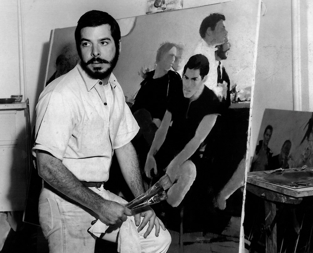 George Dureau in front of his painting La Casa de los Marinos, 1964. Courtesy of the Times-Picayune Advocate Photography Archive.